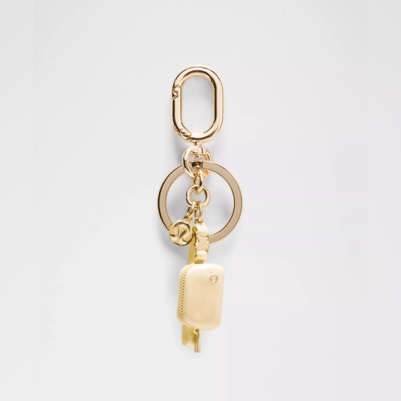 🆕💛 Lululemon Everywhere Belt Bag Charm Keychain Butter Cream Gold - Picture 1 of 2